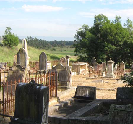 Pioneer family members rest-in-peace at McGraths Hill overlooking the rich farmland around Windsor